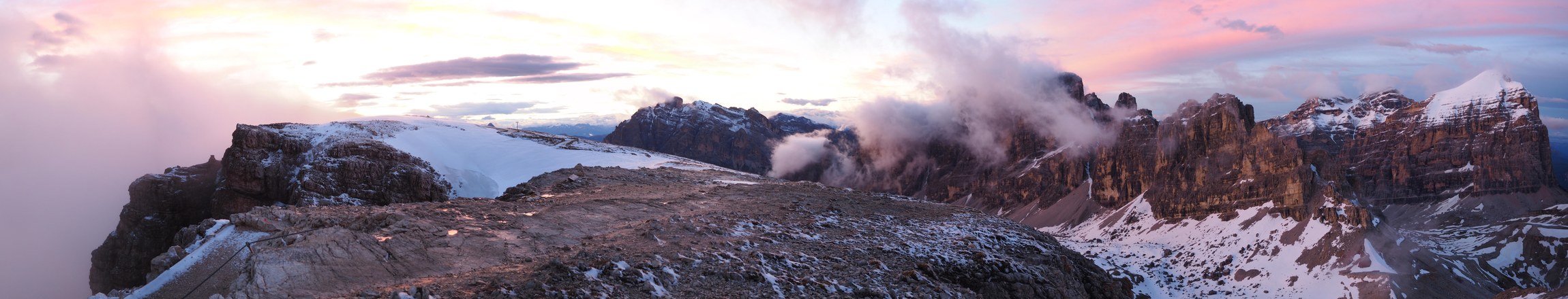 Mountain ridge above the clouds at dusk, Italy